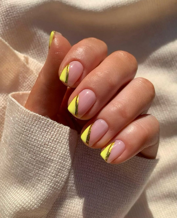 Diseños de uñas en color amarillo pastel